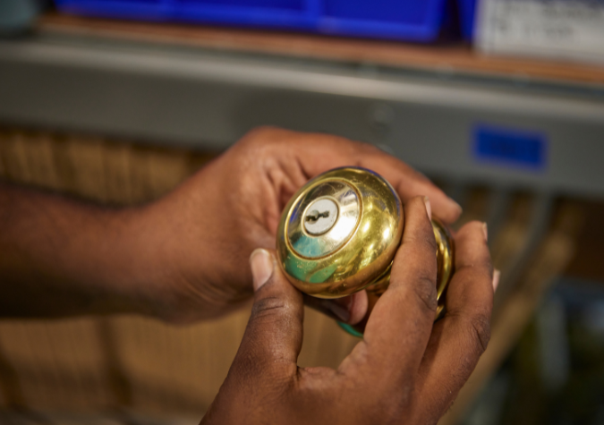 ReStore shopper holding a door knob