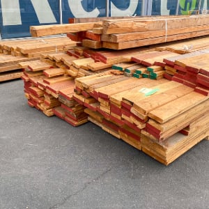 stacks of wood plank piles